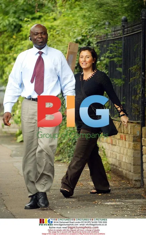 Actress Jessie Wallace leaves hospital with boyfriend