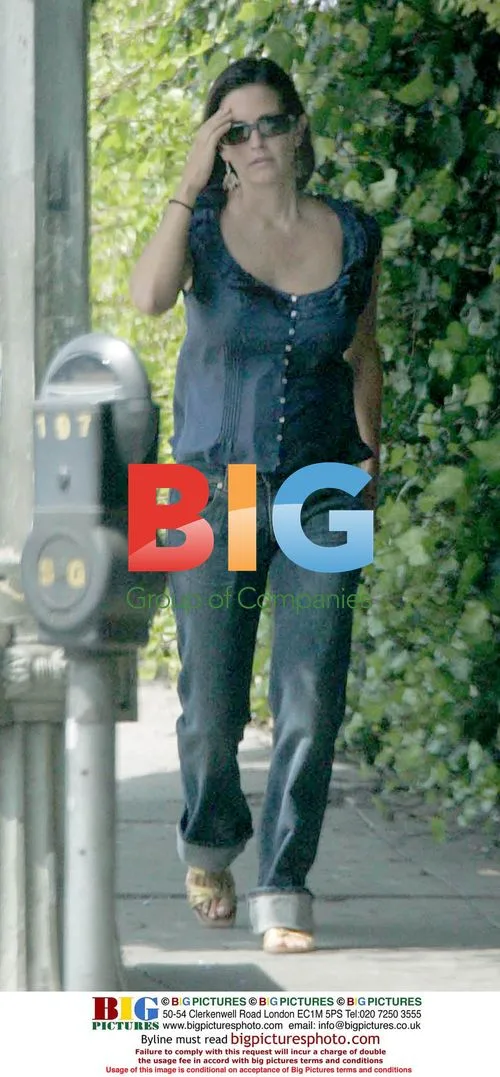 Courtney Cox Leaving Hotel