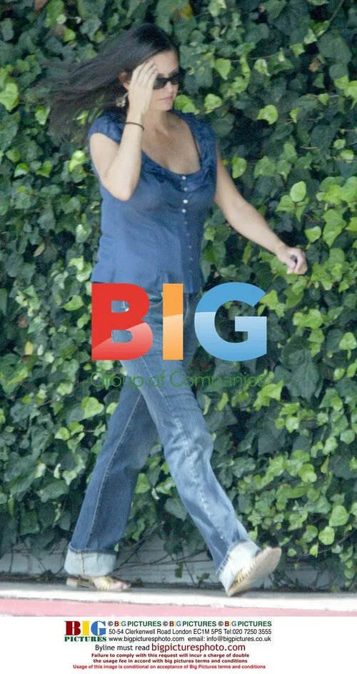 Courtney Cox Leaving Hotel