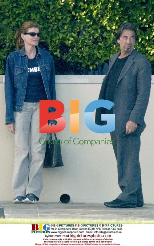 Al Pacino and Rene Russo outside hotel