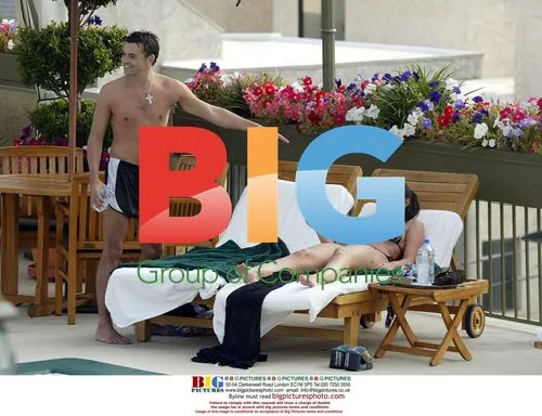 Michelle Heaton and Boyfriend Relaxing by Pool