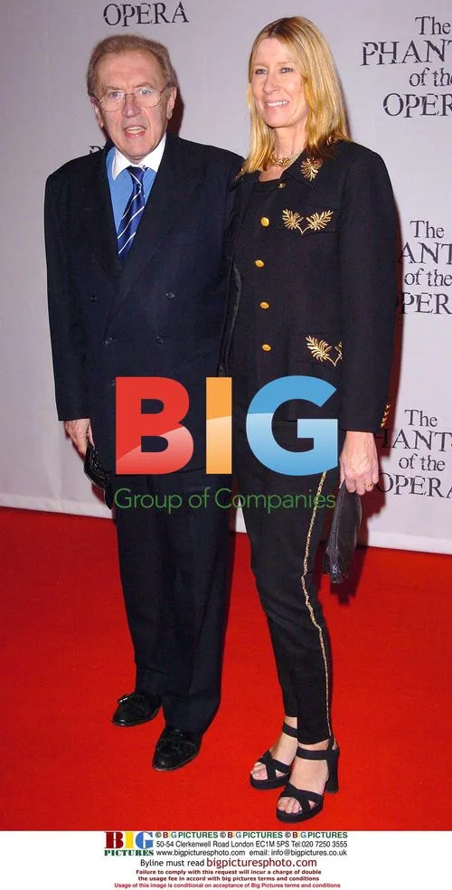 Sir David Frost and guest at 'Phantom' premiere