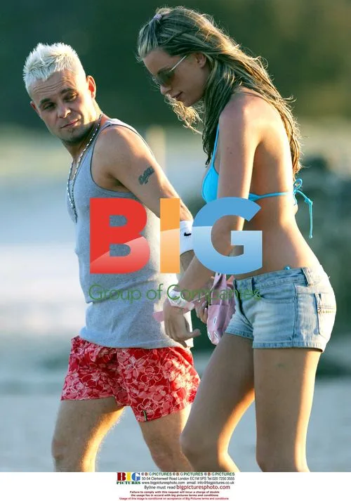 Emma and Brian Relax on Beach