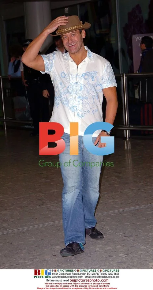 Butler Paul Burrell Returns to UK After Reality Show