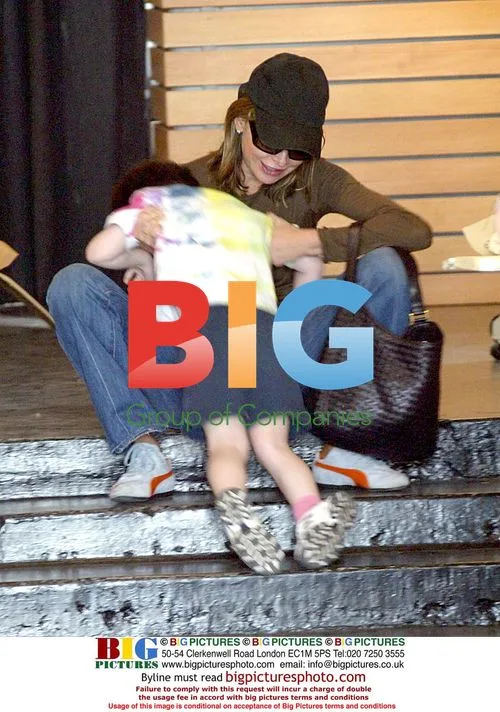 Calista Flockhart and son Liam out Christmas shopping