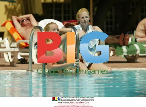 Glamour Models Michelle Marsh and Jo Hicks in Pool