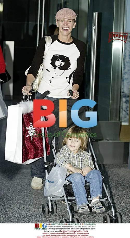 Natasha Henstridge Shopping with Son