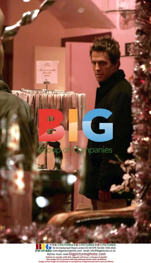 Hugh Grant Buys Christmas Lingerie