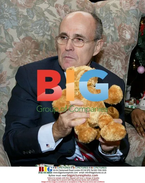 Rudy Giuliani Distributes Gifts to Children