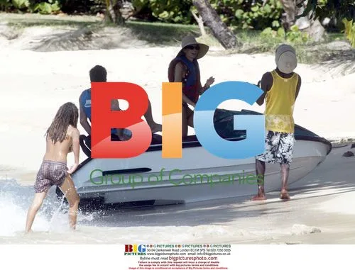 Hugh Grant and Jemima Khan jet skiing in Caribbean