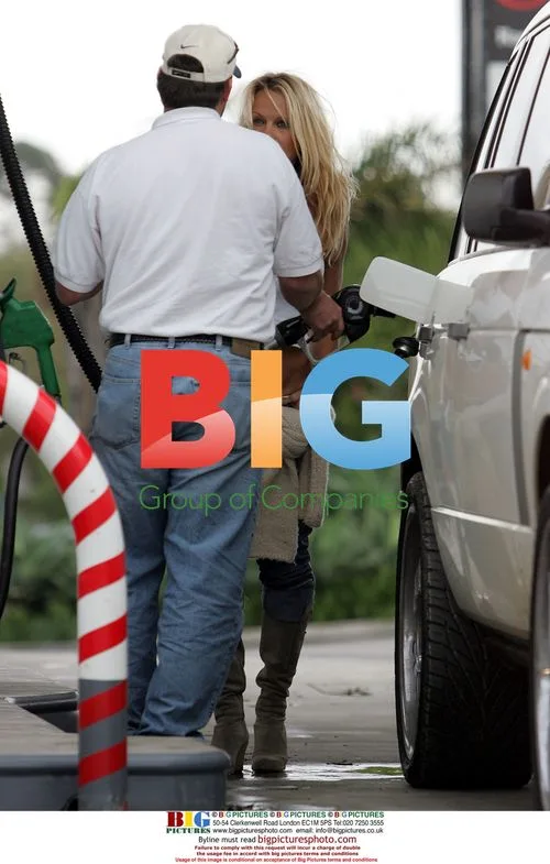 Pamela Anderson Struggles at Gas Pump