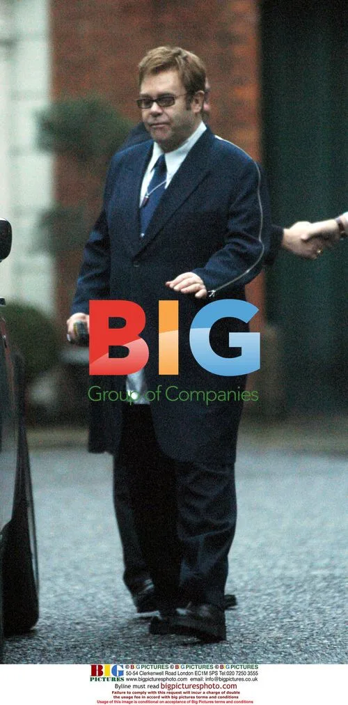 Elton John leaves T. Goode store in London