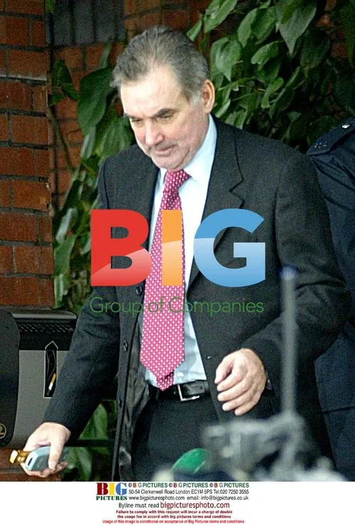 George Best Leaving Wimbledon Court
