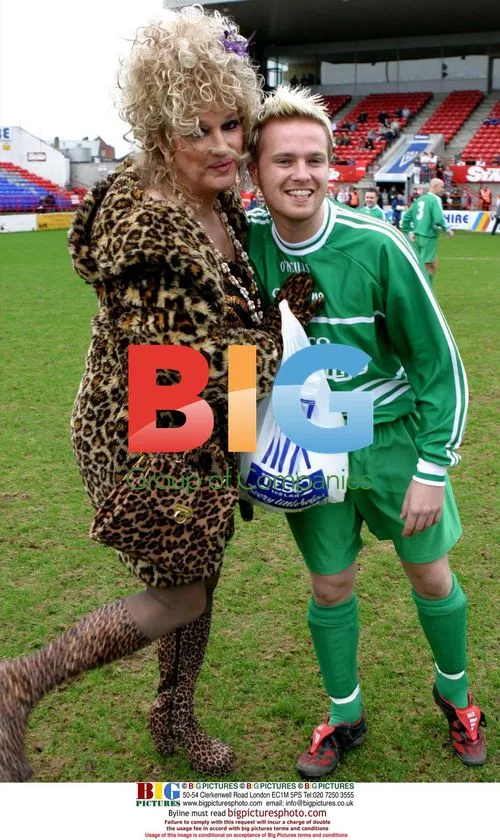 Drag Artist Mr Pussy and Nicky Byrne at Charity Fundraiser