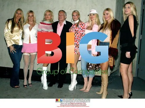 Hugh Hefner and Playboy Playmates at Hollywood Club