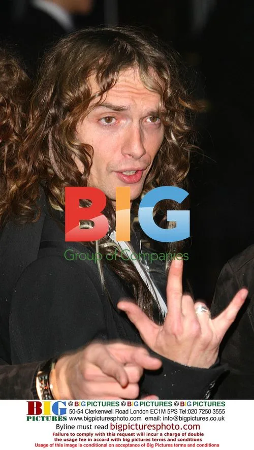 Justin from The Darkness at BRIT AWARDS 2004