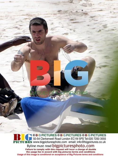 Liam Gallagher and Natalie Appleton with Son Gene on Caribbean Vacation