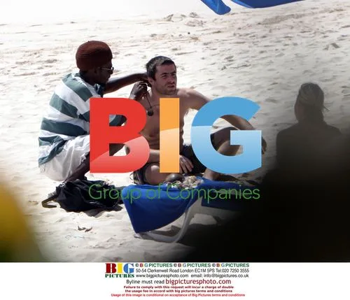 Liam Gallagher and Natalie Appleton with Son on Beach