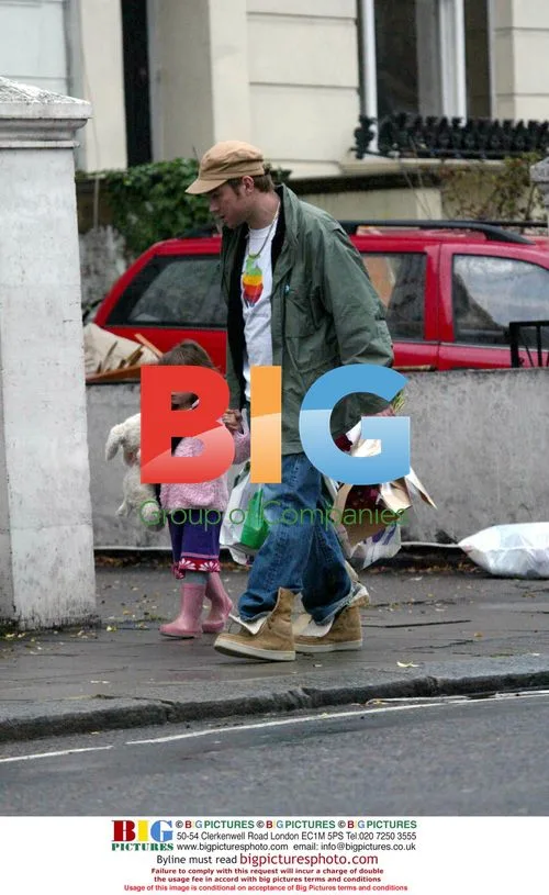 Damon Albarn with wife and daughter in London