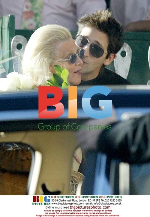 Adrien Brody kisses elderly woman