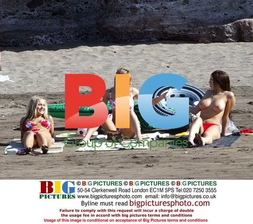 Models Sunbathing on Holiday