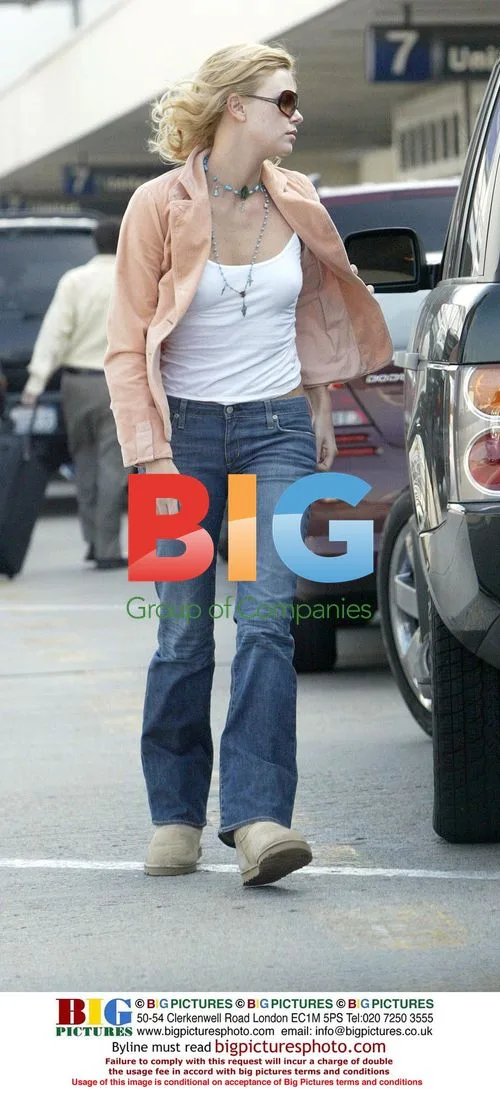 Charlize Theron Drops Off Boyfriend at LAX