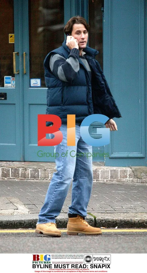 Nick Pickard Chatting on Mobile in London