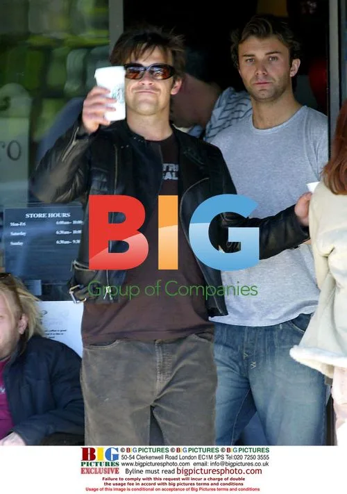 Singer Robbie Williams Greets Fans