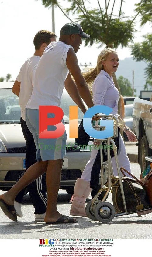 Jennifer Ellison and Boyfriend Arriving in Spain