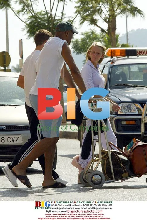 Jennifer Ellison and Tony Arrive in Spain