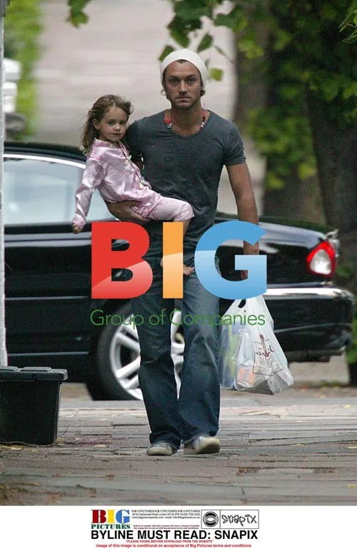 Jude Law out with daughter Iris