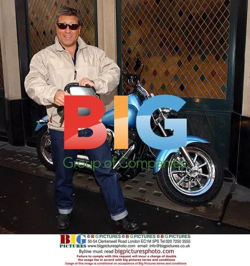Neil "Dr. Fox" shows off Harley Davidson