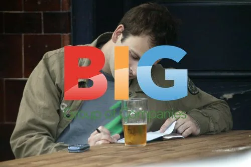 Jonny Lee Miller Writing Outside Pub