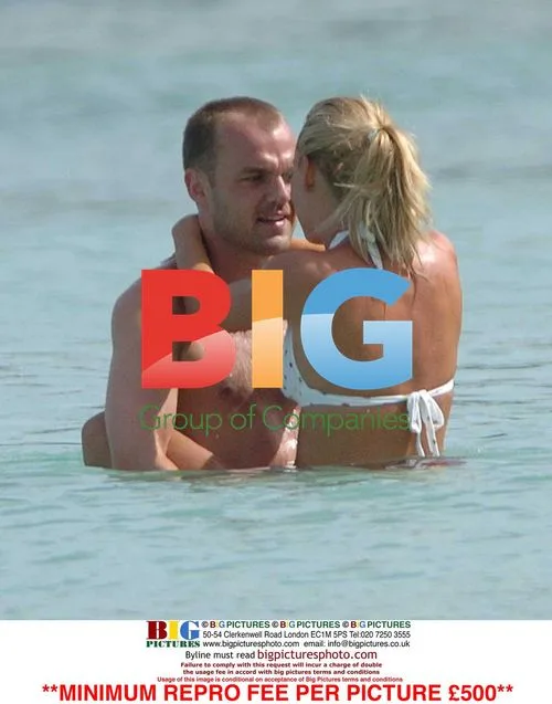 Joanna Taylor and Danny Murphy swim in Caribbean