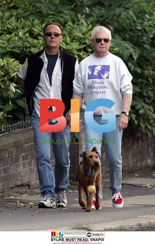 Sir Derek Jacobi out walking dog in London