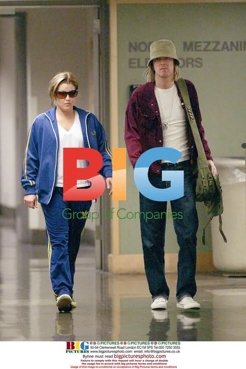 Lisa Marie Presley and Micheal Lockwood leaving hospital