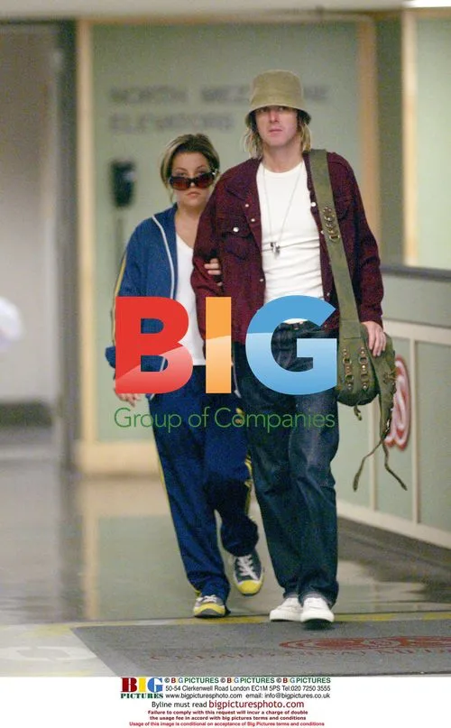 Lisa Marie Presley and Micheal Lockwood Leaving Hospital