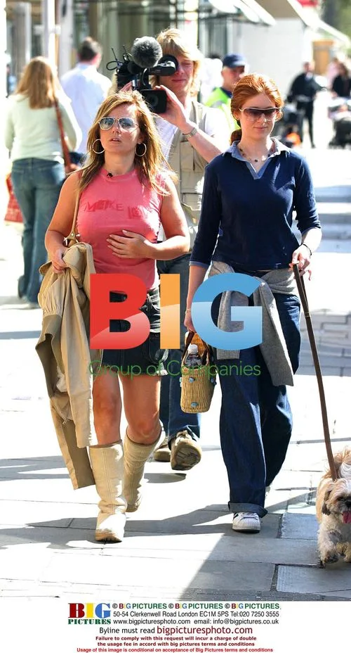 Geri Halliwell with dog on way to market