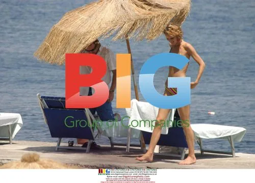 Eva Herzigova with 'Modigliani' director on beach