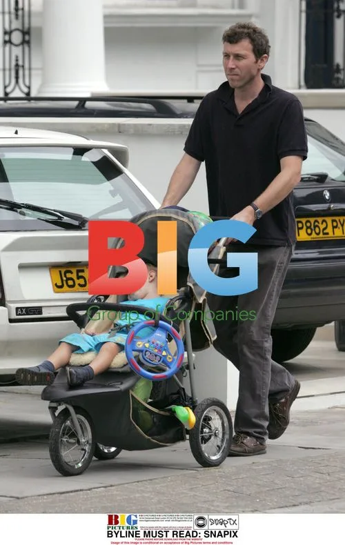 Mike Atherton Taking Baby for Walk