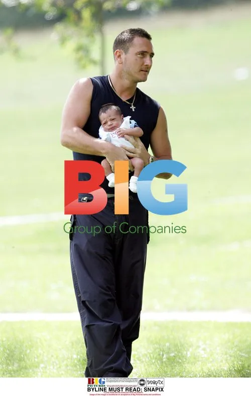 Will Mellor and Girlfriend Walk in Park with Baby