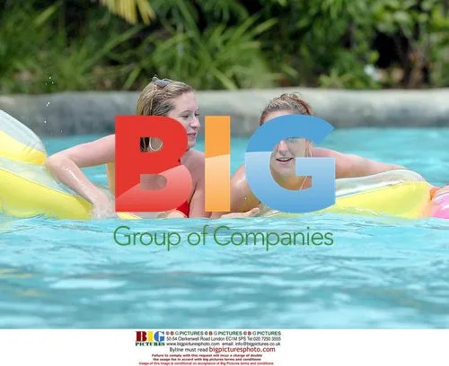 Brooke Kinsella and Friend Enjoying Caribbean Pool