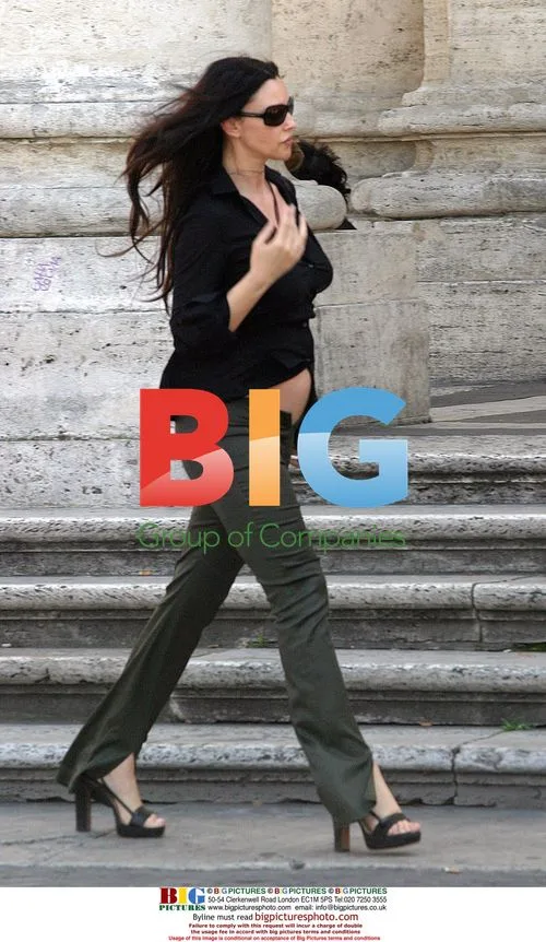 Pregnant Monica Bellucci Leaves Hotel for Lunch