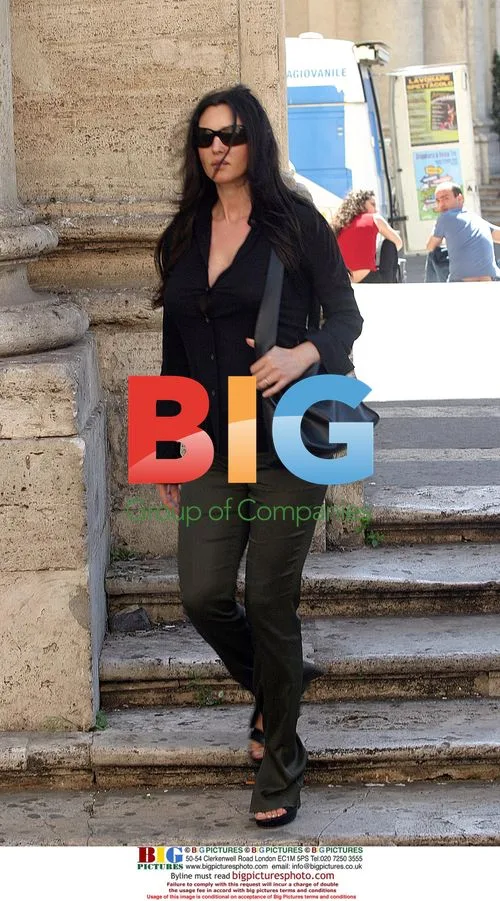 Pregnant Actress Monica Bellucci Leaves Hotel