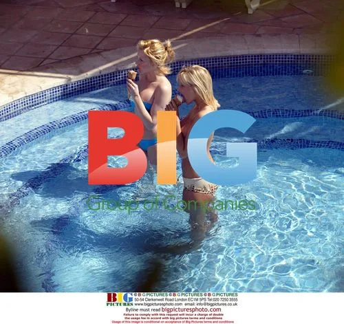 Glamour Models Michelle Marsh and Jo Hicks Poolside
