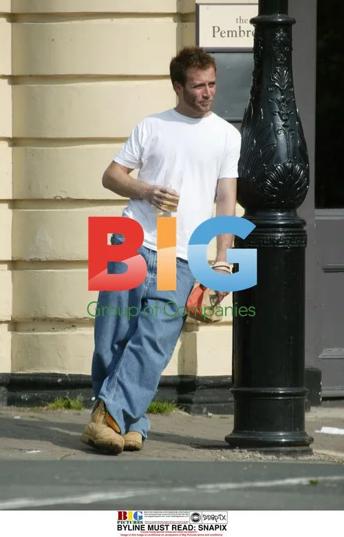 Jason Brown with Drink and Bag