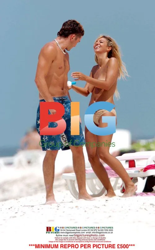 Jodie Marsh Topless Beach Fun with Boyfriend