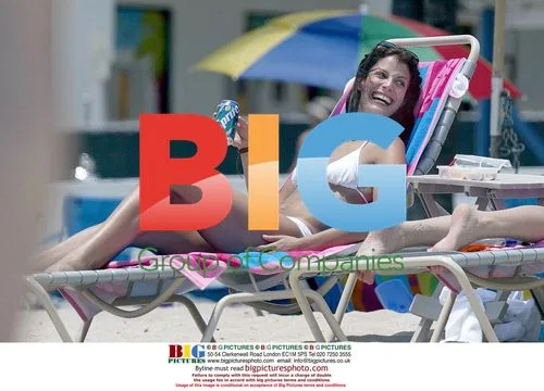Dayanara Torres plays with son on beach