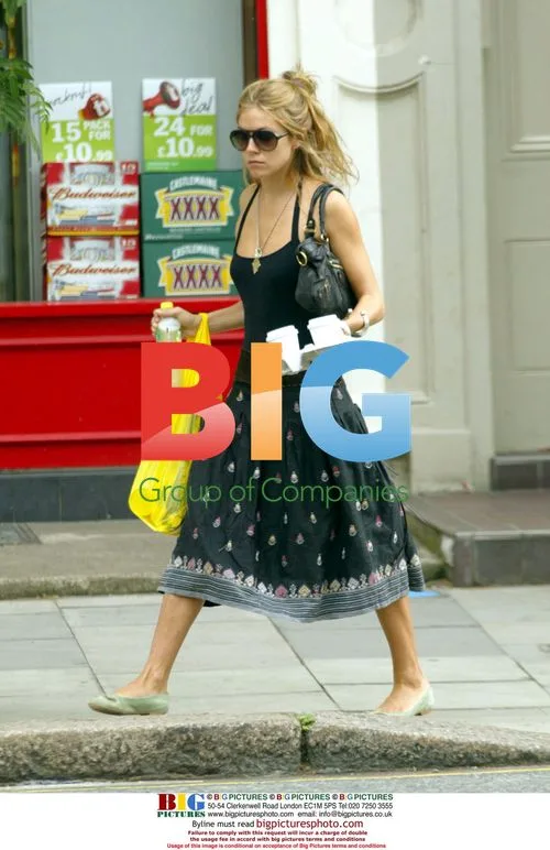 Sienna Millier Grabs Takeaway Coffee in North London