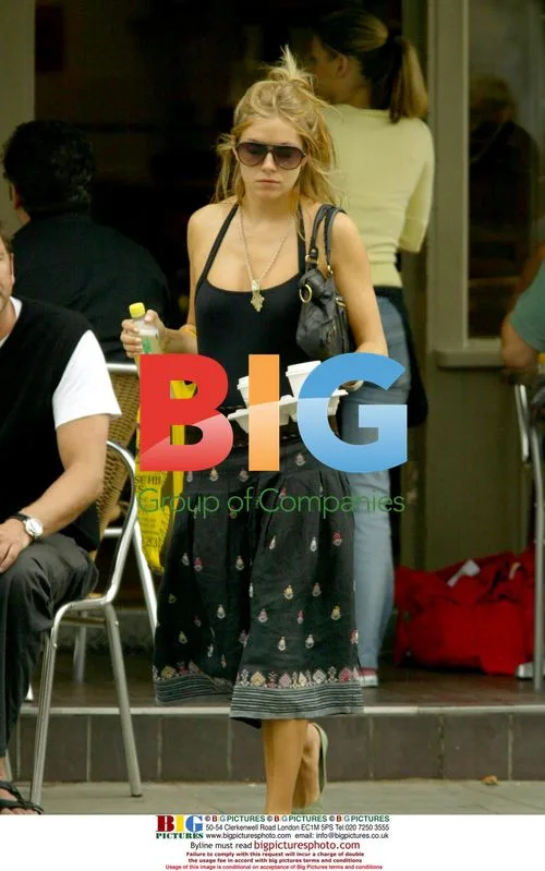 Sienna Millier Grabbing Coffee in London